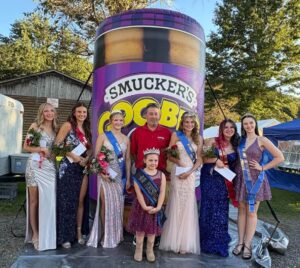 The 2026 Queen and court with the scholarship sponsor representative